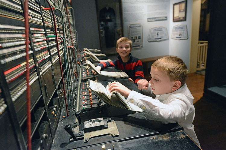 Kids at telephone switchboard