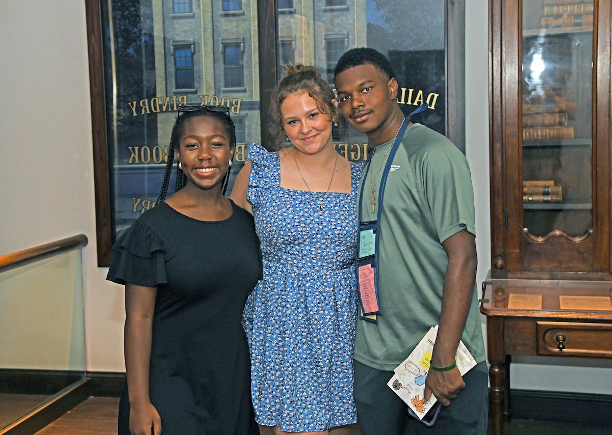 Students pose for a photo in the museum