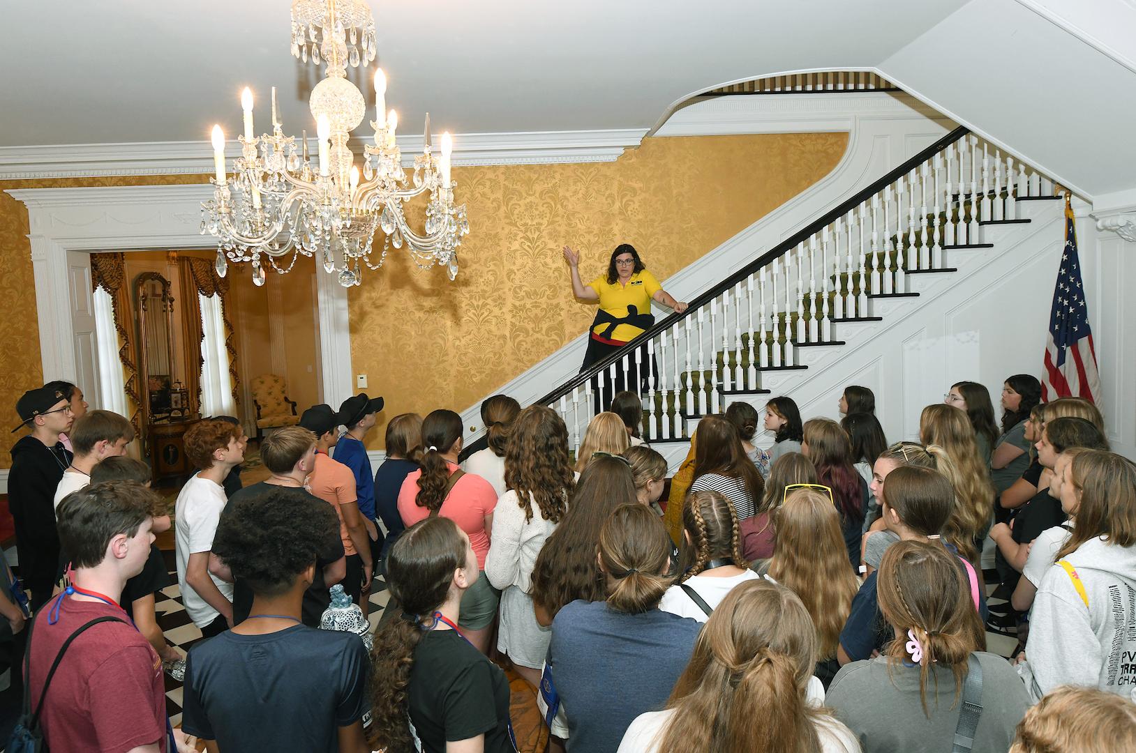 Tour guide speaks to group in Governor's Mansion